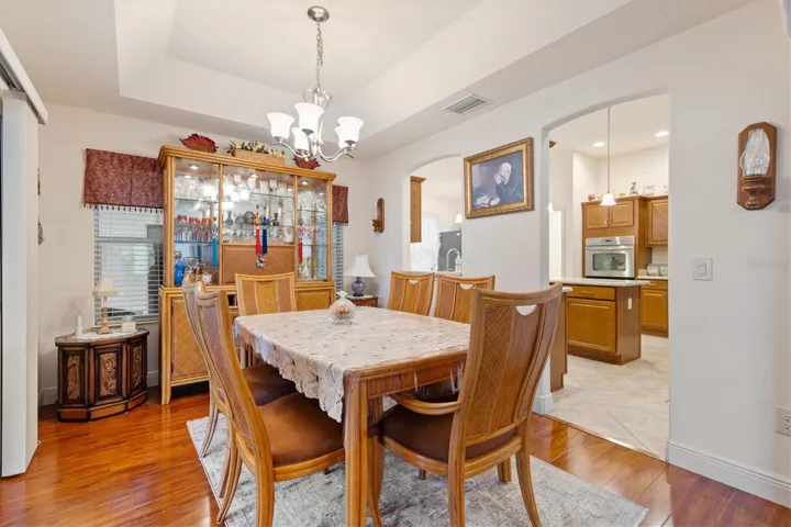 Dining Roo with tray ceiling.