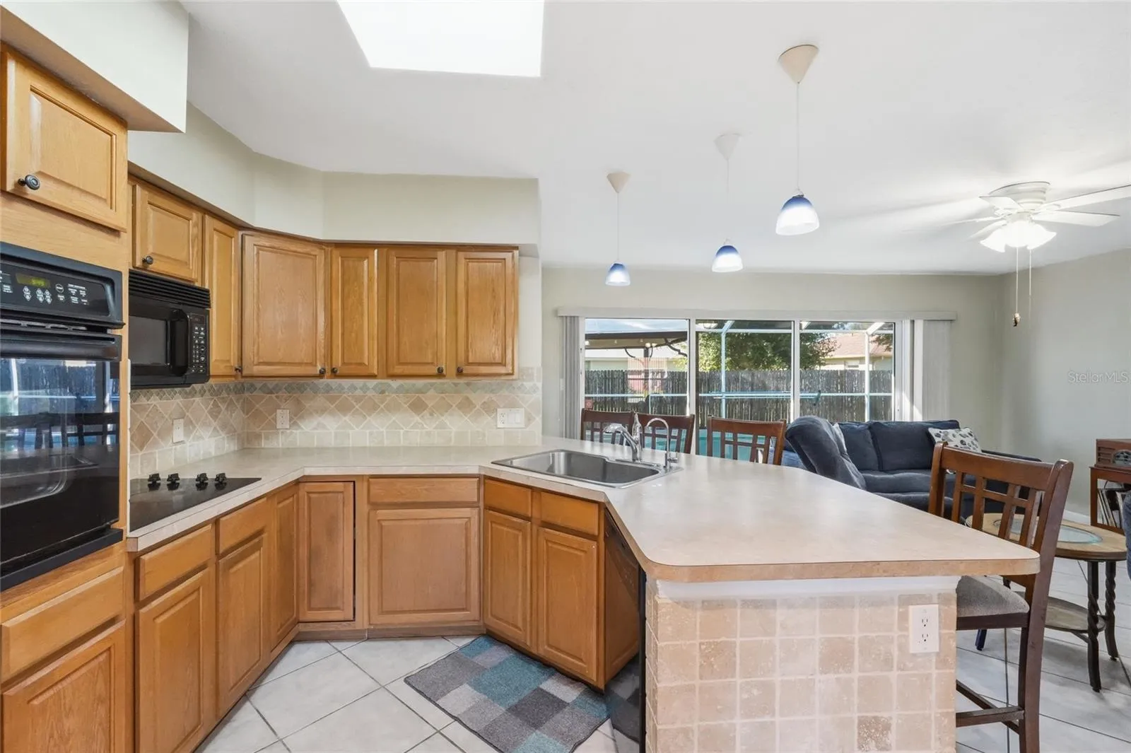Kitchen overlooks the pool