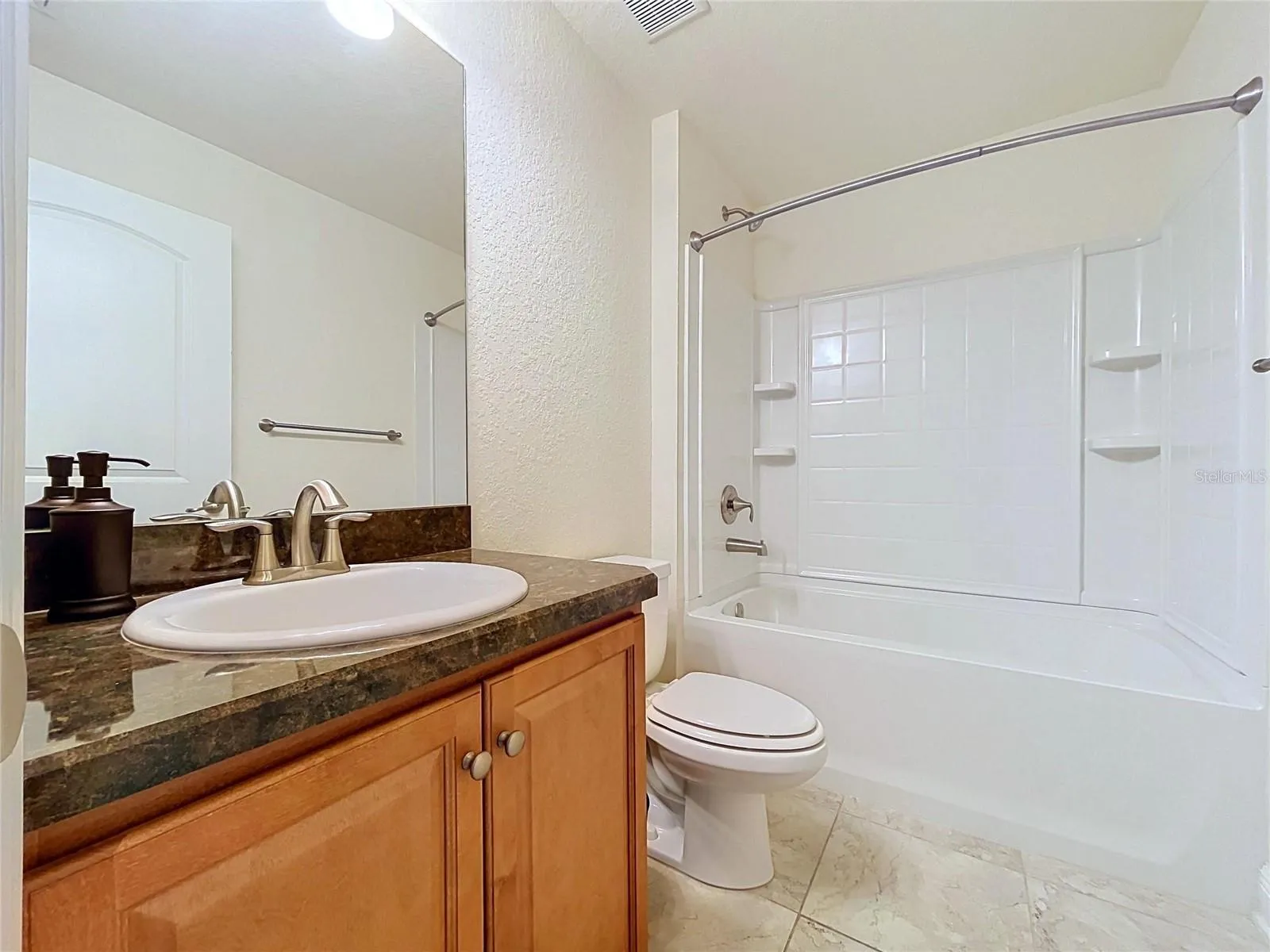 GUEST BATHROOM WITH SHOWER AND TUB
