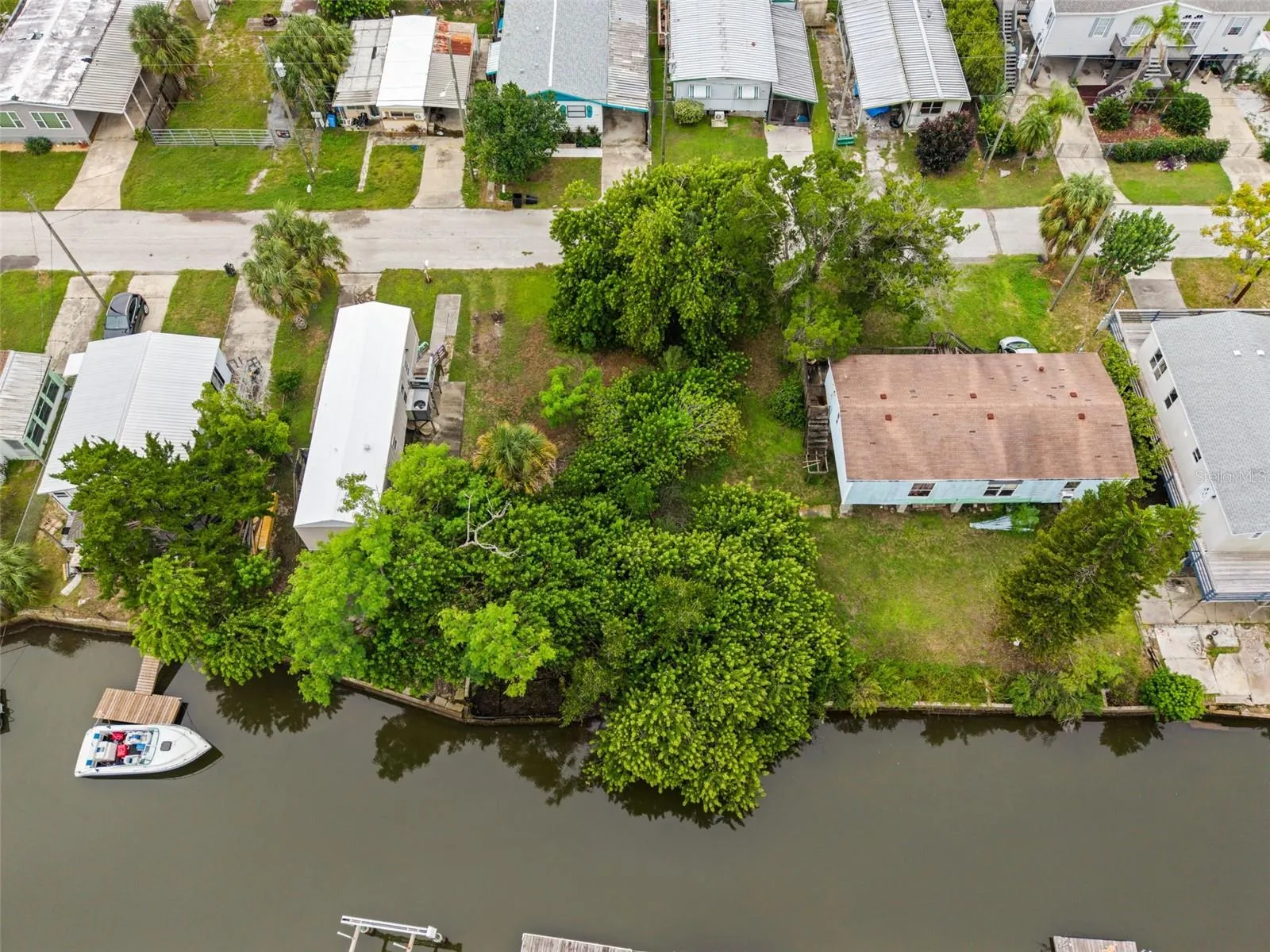 Waterfront view highlighting the existing seawall and opportunity to create your own Florida retreat.