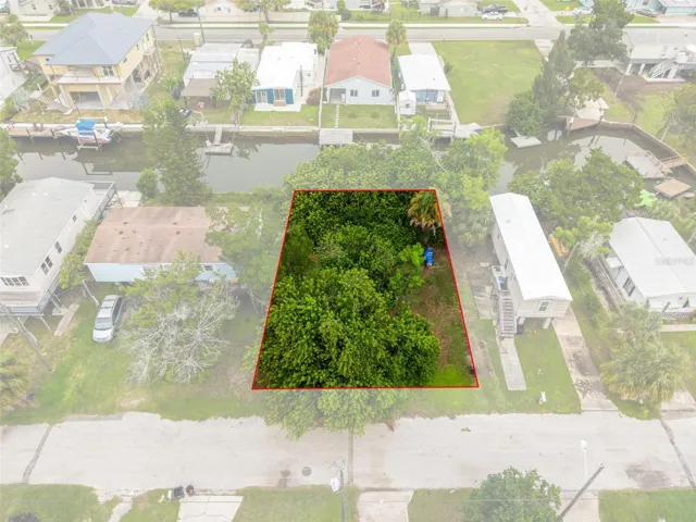 Outlined aerial view highlighting the approximate property boundaries of this waterfront lot.