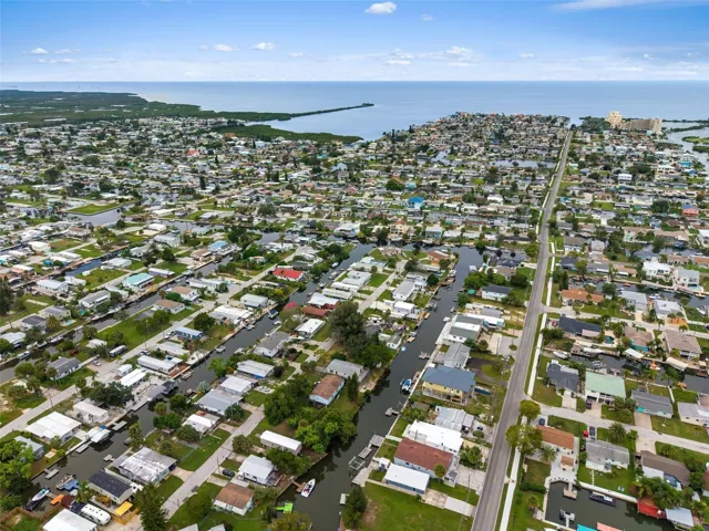 Beautiful aerial perspective showcasing the waterfront community and convenient access toward the Gulf.