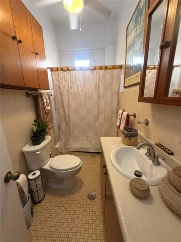 Complete bathroom with bath tub