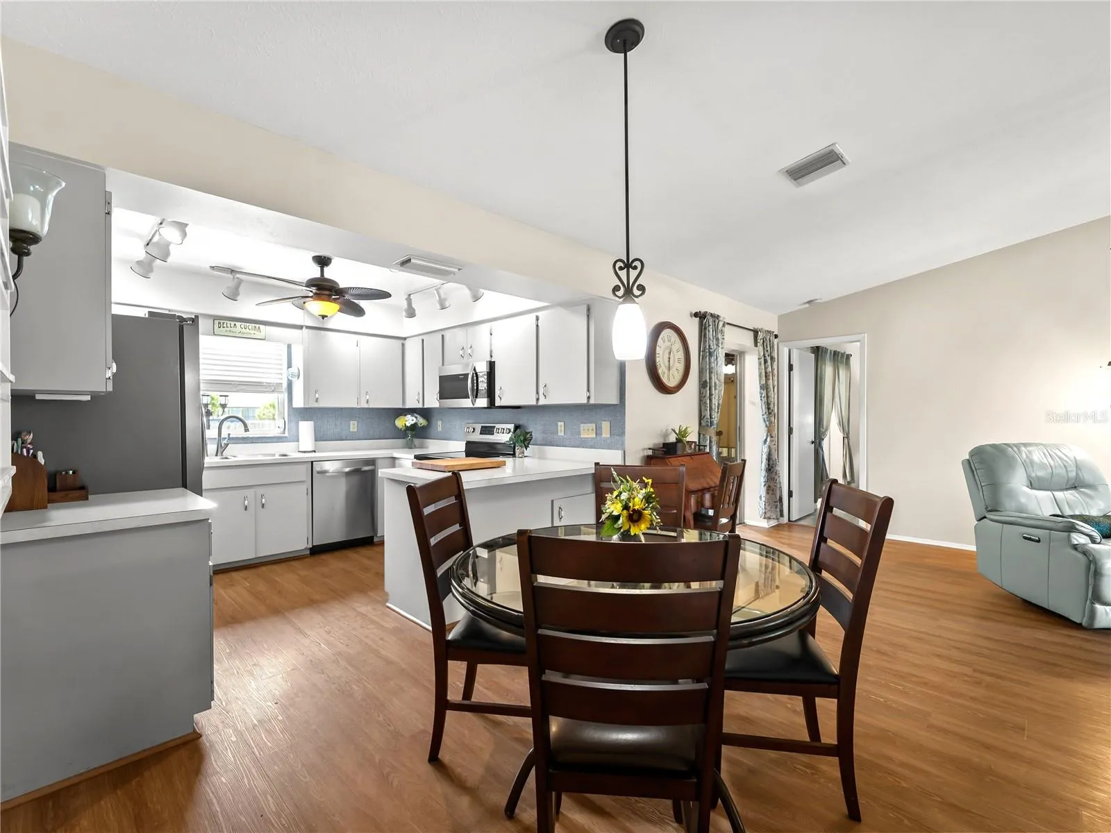 Open to kitchen and living room