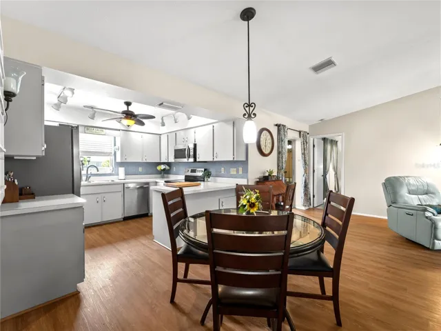 Open to kitchen and living room
