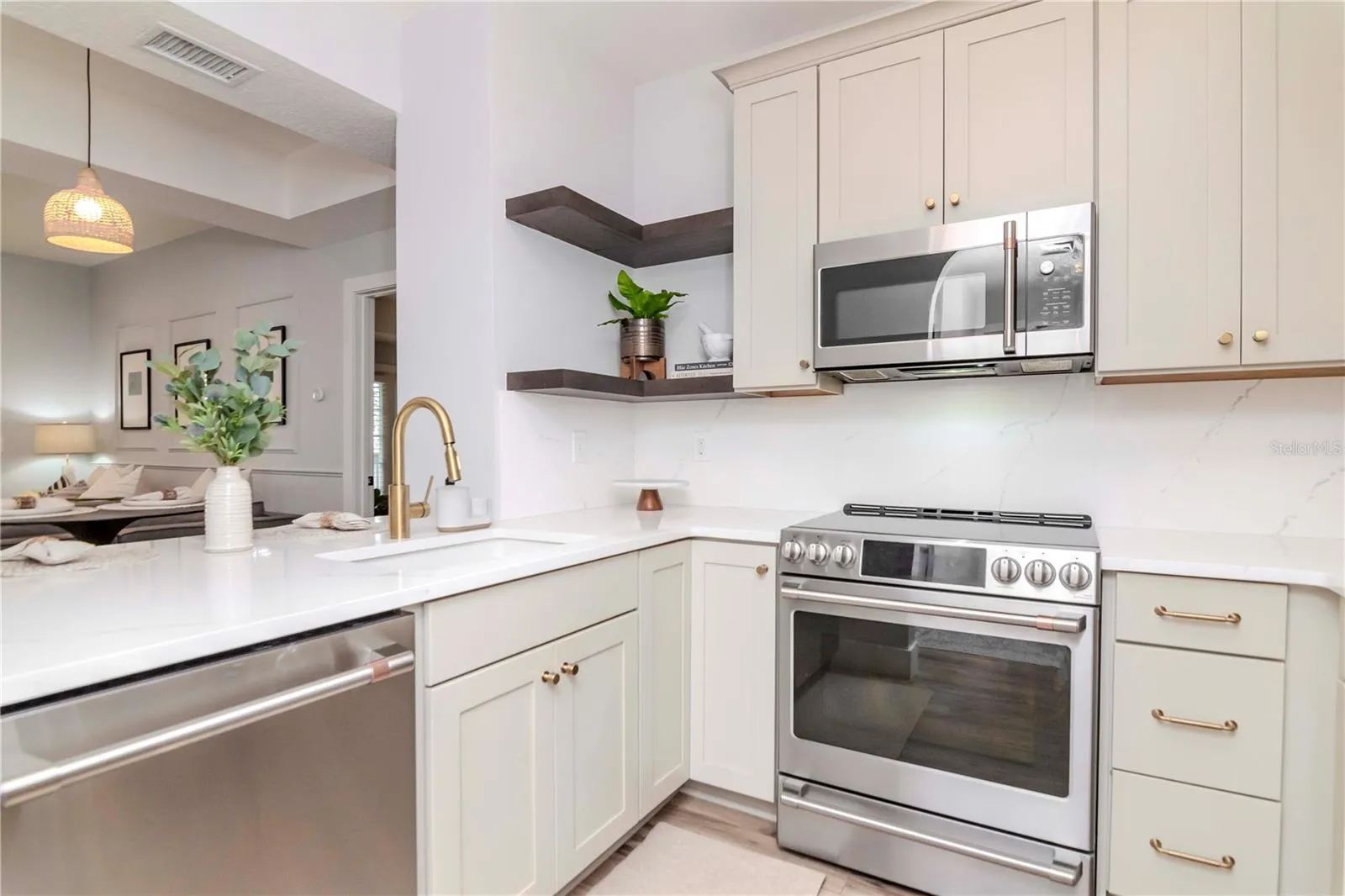 Updated Kitchen with Custom Cabinetry, GE Cafe' Appliances, &amp; Quartz Countertops
