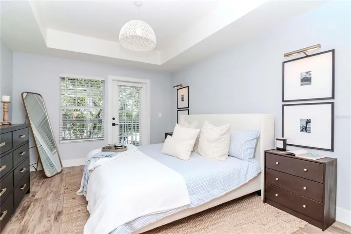 Primary Bedroom with En Suite Bathroom - Opens to Private Patio