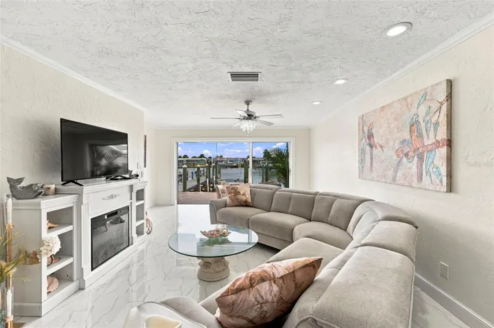 Water view from the Kitchen, Dining Room, Living Room, and Primary Bedroom!