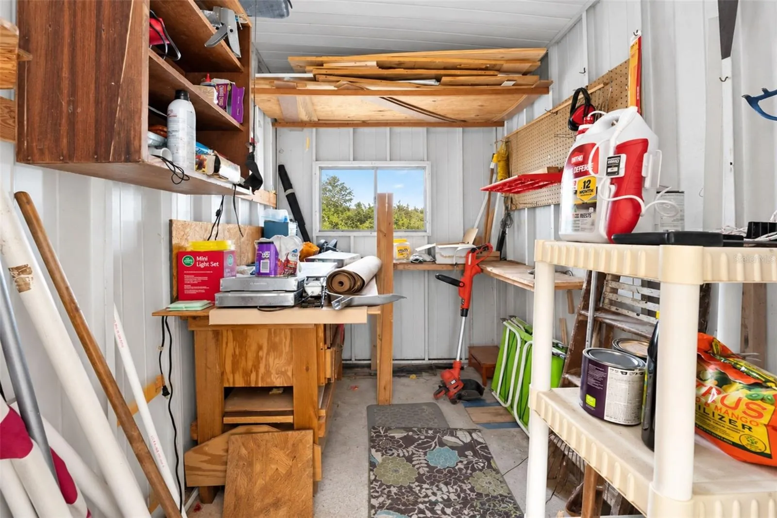 Work shop/storage area in enclosed porch