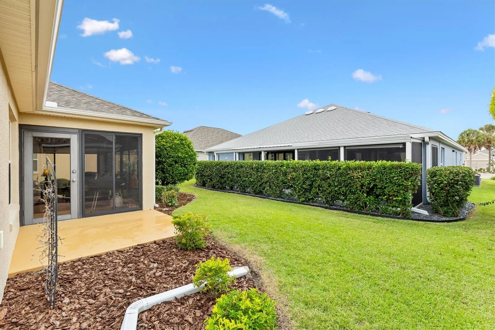 Side of Florida Room - Notice Neighbors Privacy Bushes