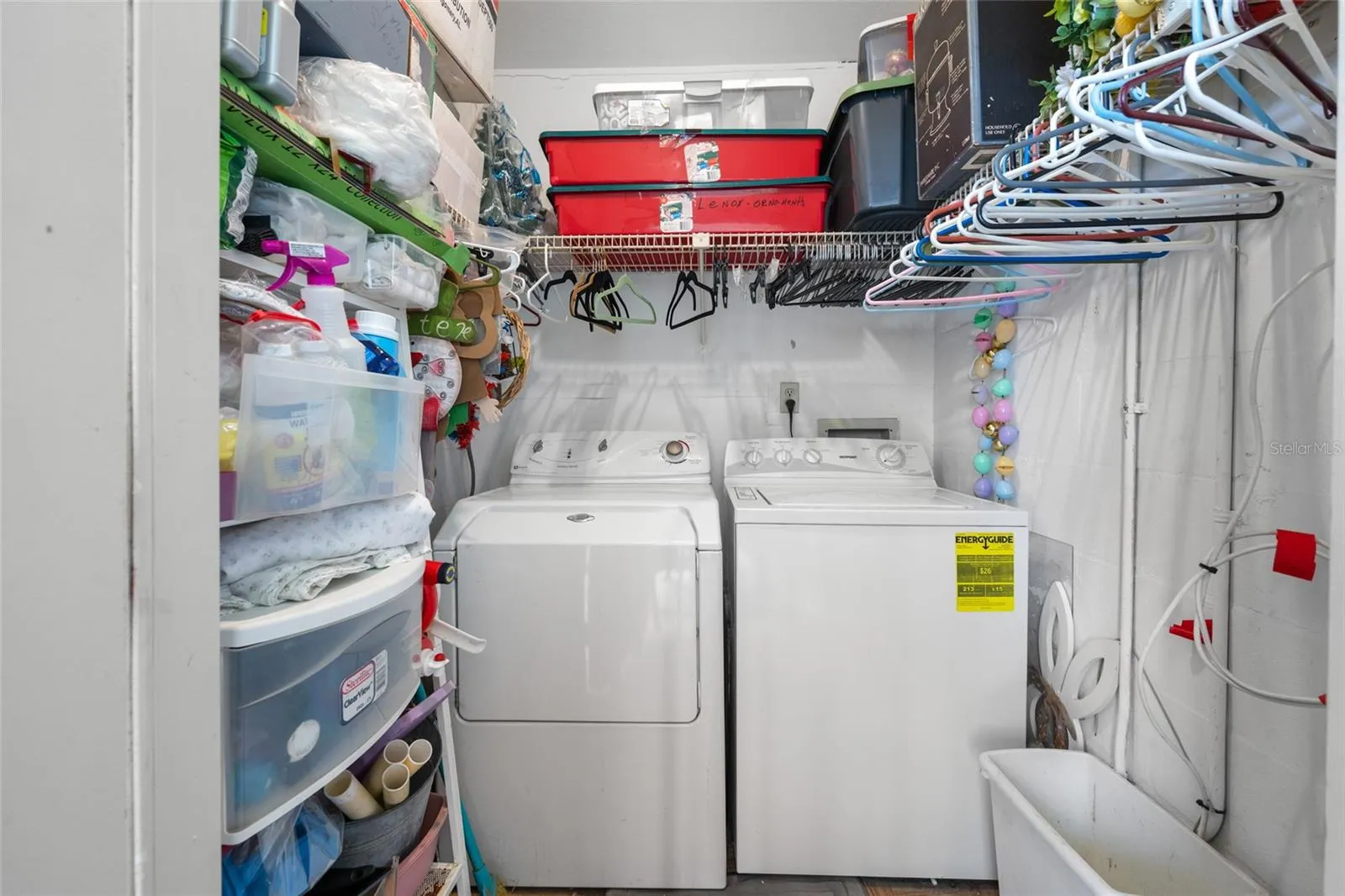 Laundry room with full size washer and dryer