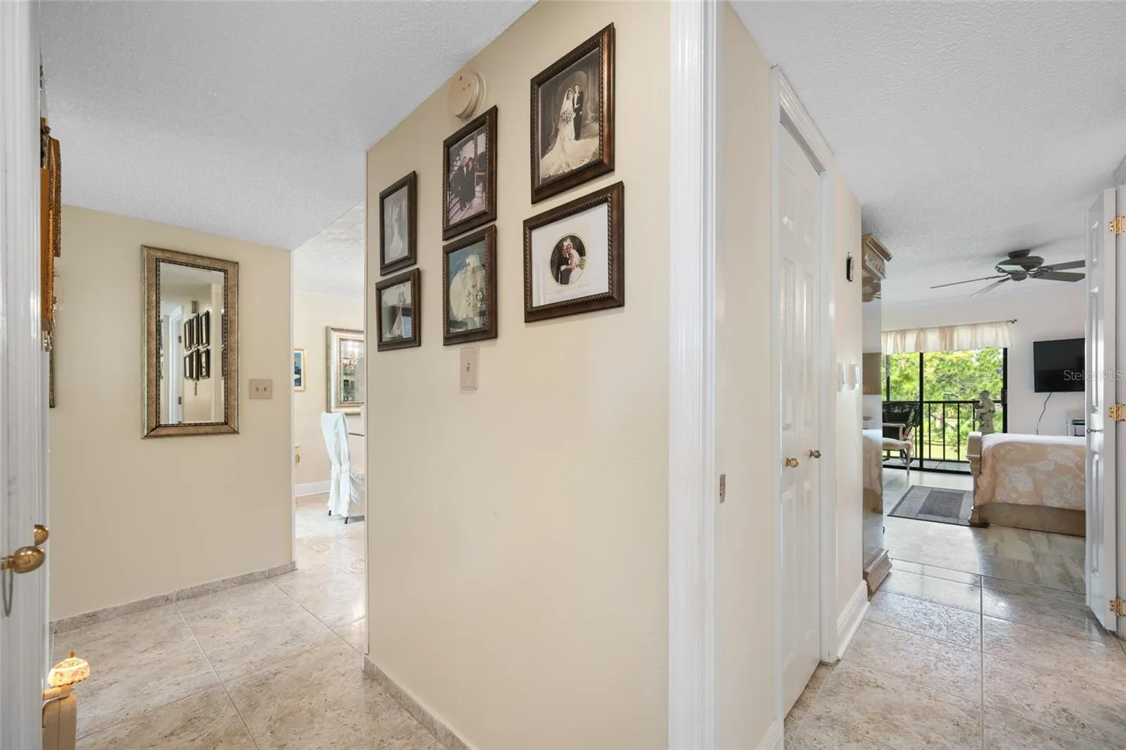 Hallway leading from living area lo primary bedroom
