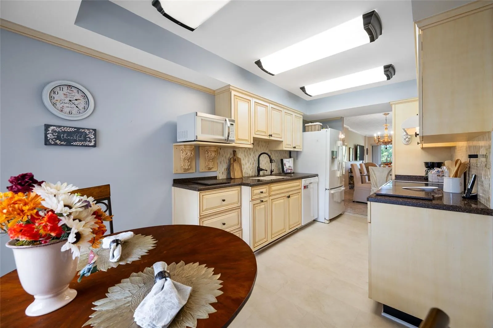 Custom cabinetry.  Appliances included, French door Refrigerator, Dishwasher, and Counter Microwave.and Range