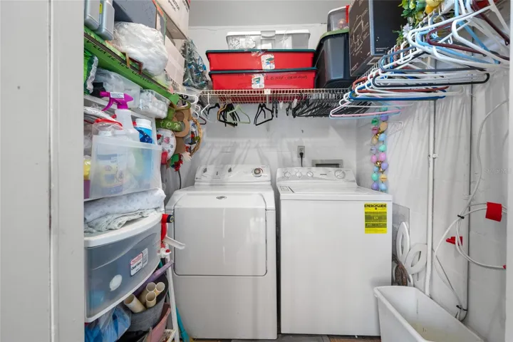 Laundry room with full size washer and dryer