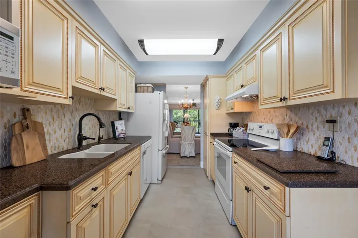 Custom Cabinetry, Granite Countertops, Tile Backsplash