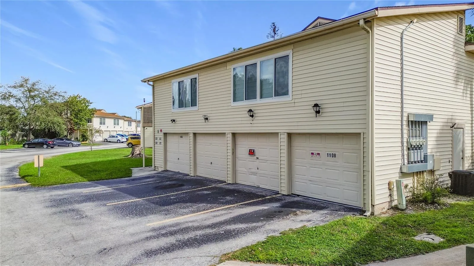 Garage entrances and parking area.