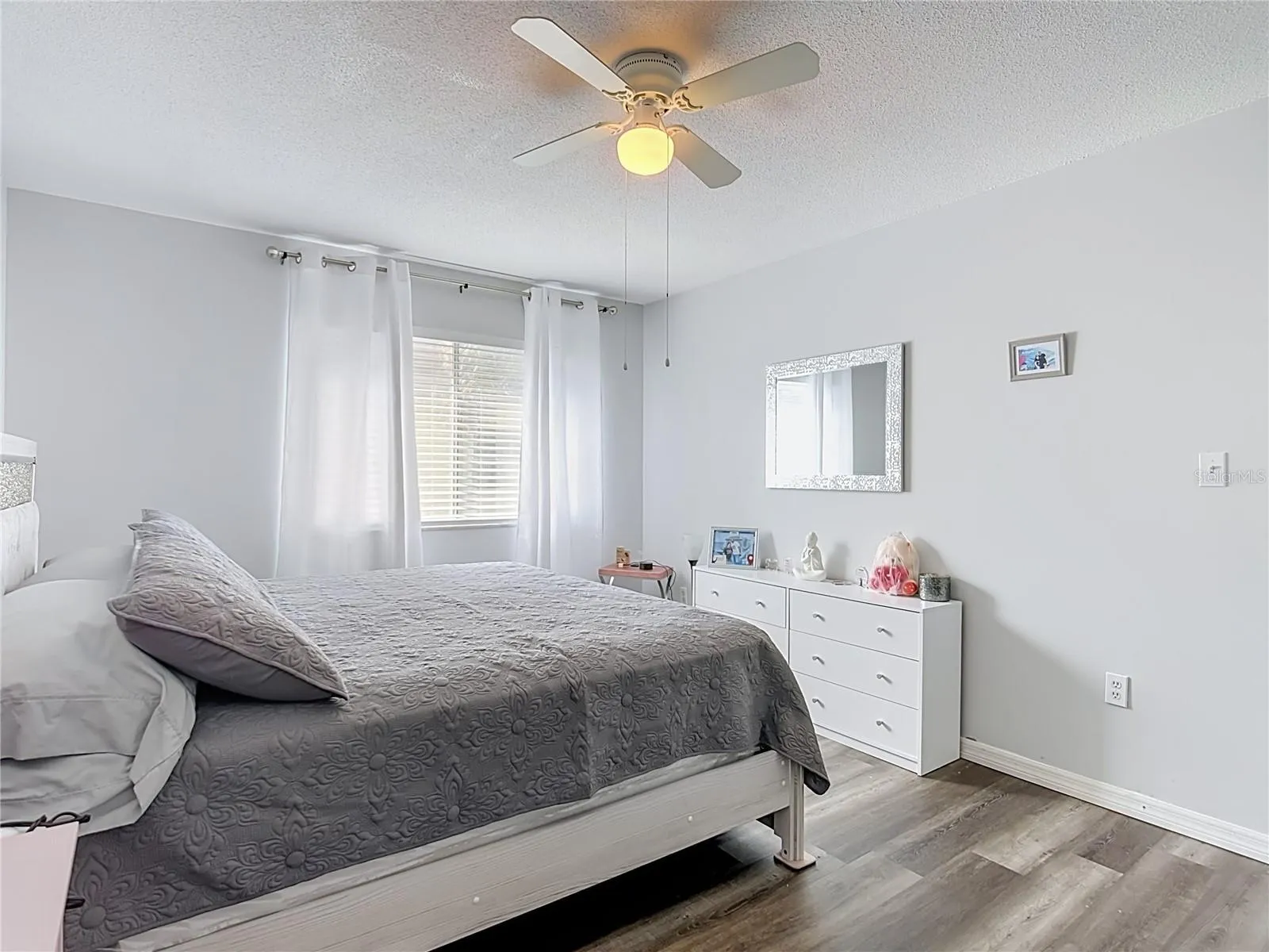 Inviting bedroom with natural light.