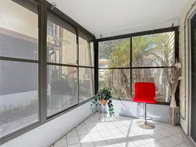 Screened porch for relaxing.