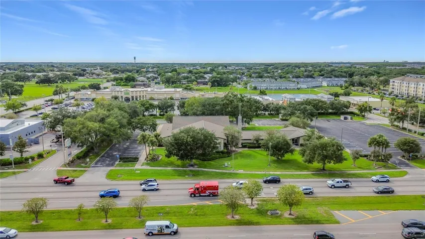 Surrounding businesses and green spaces.