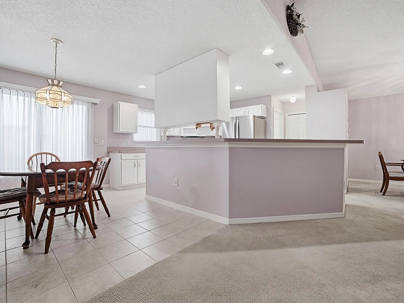 OPEN TO THE KITCHEN