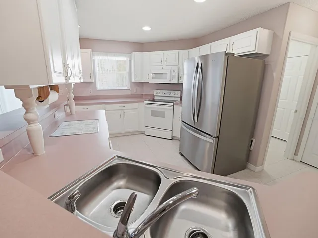 KITCHEN OPEN TO LIVING AREA