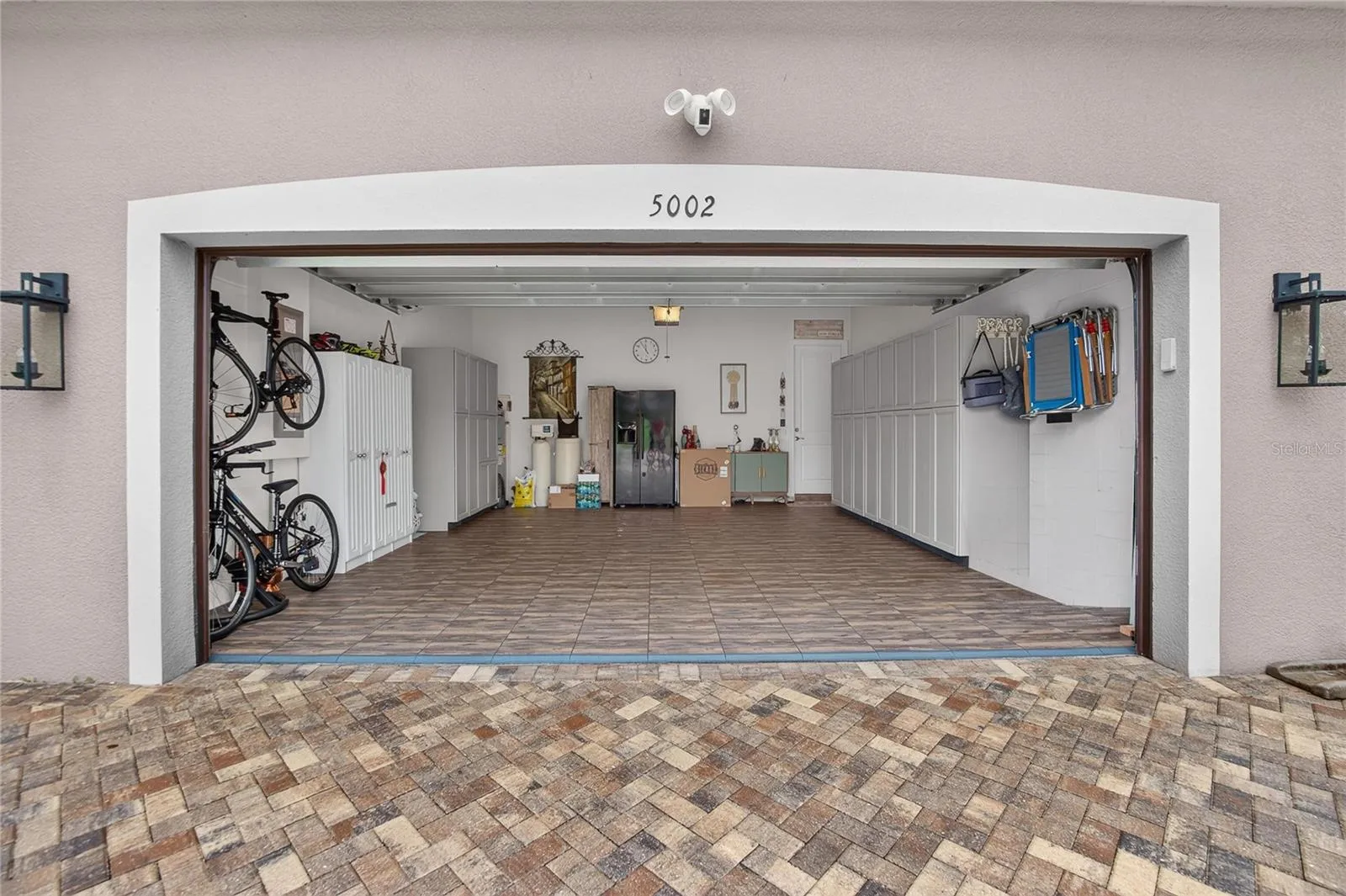 Air Conditioned Two-Car Garage with LVP Garage Flooring &amp; Insulated Garage Door
