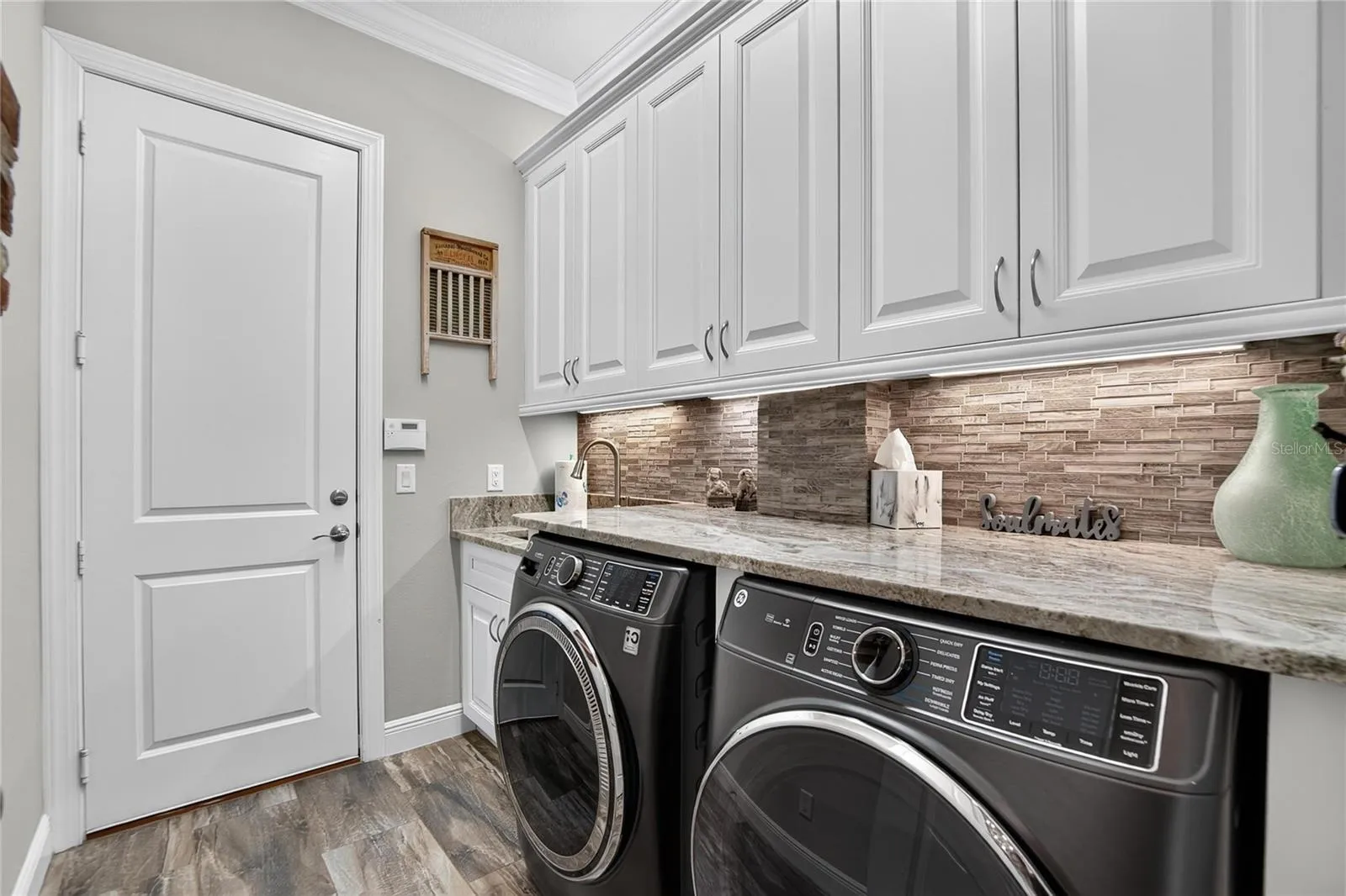 Interior Laundry Room w/Upgraded Cabinetry &amp; Granite Countertops