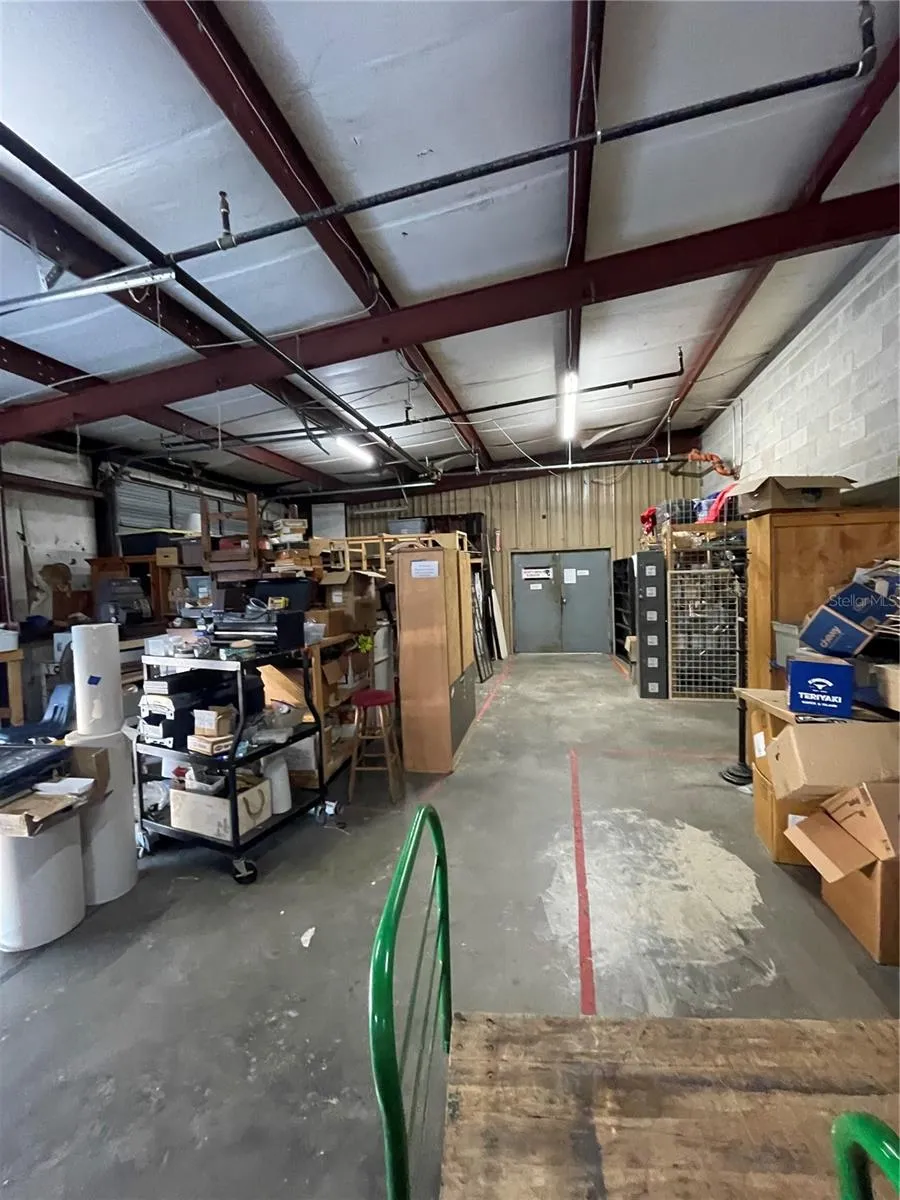 Rear of the sales floor and stock area