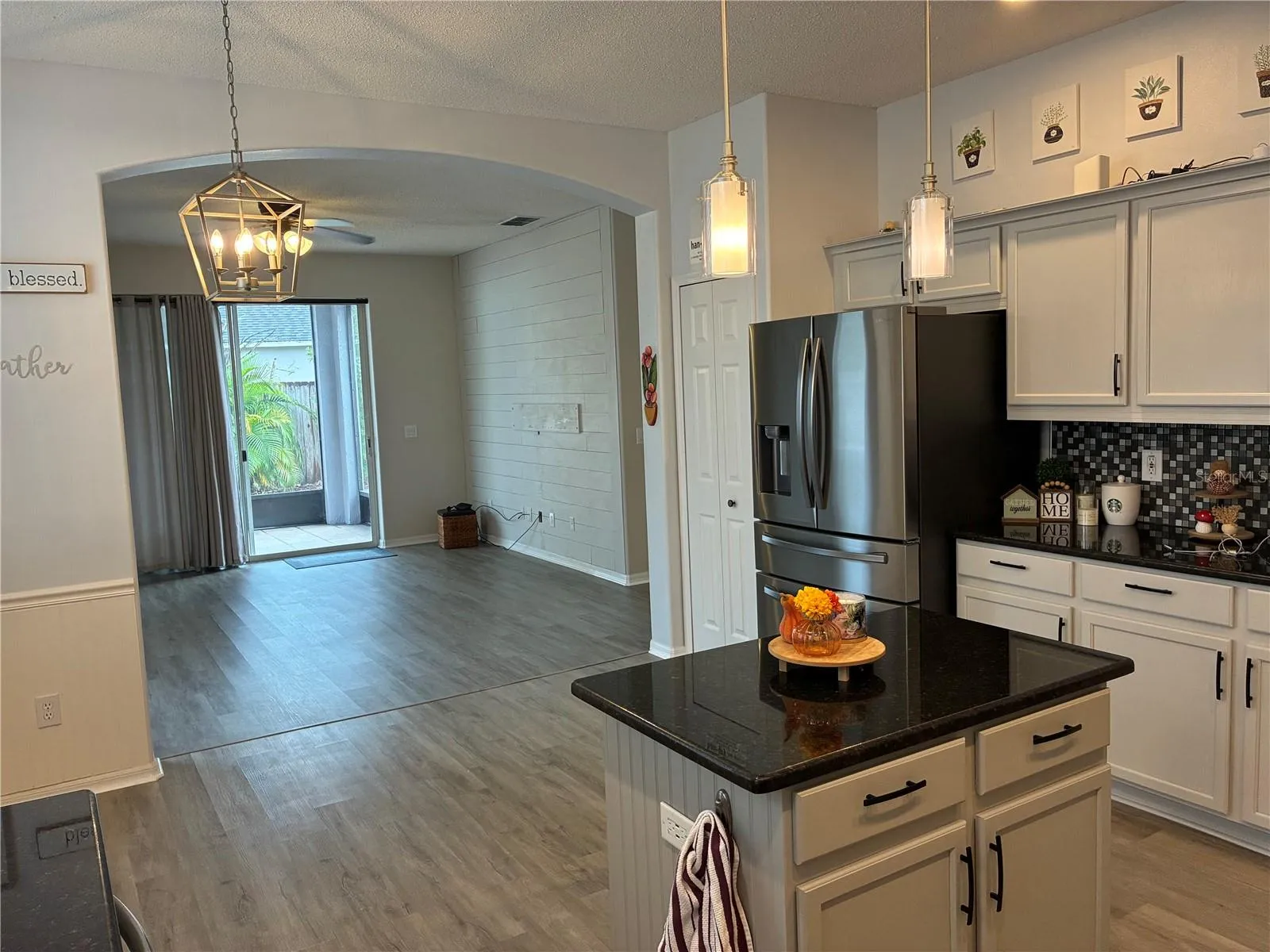 Kitchen w/ Living in background