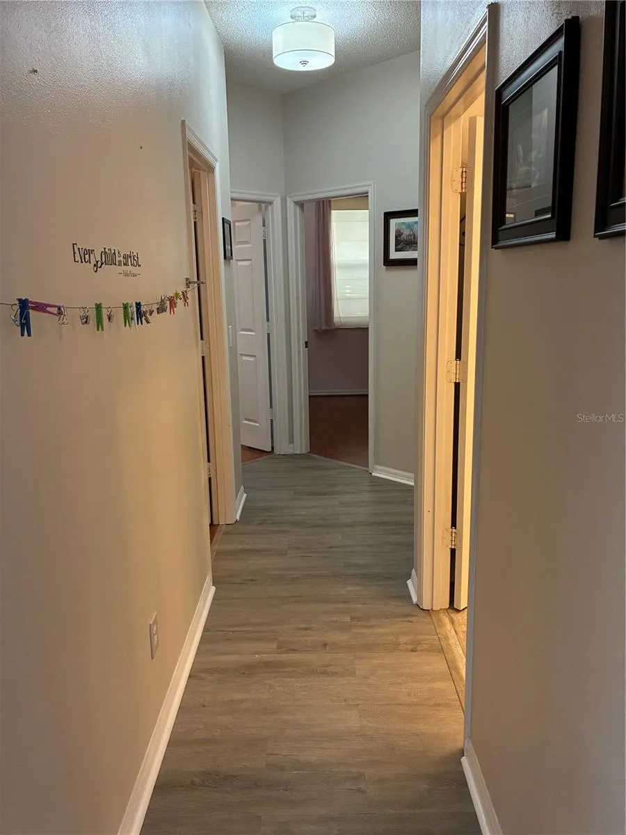 hall to 3 bedrooms