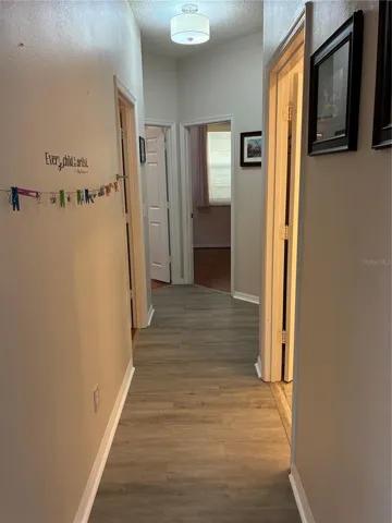 hall to 3 bedrooms