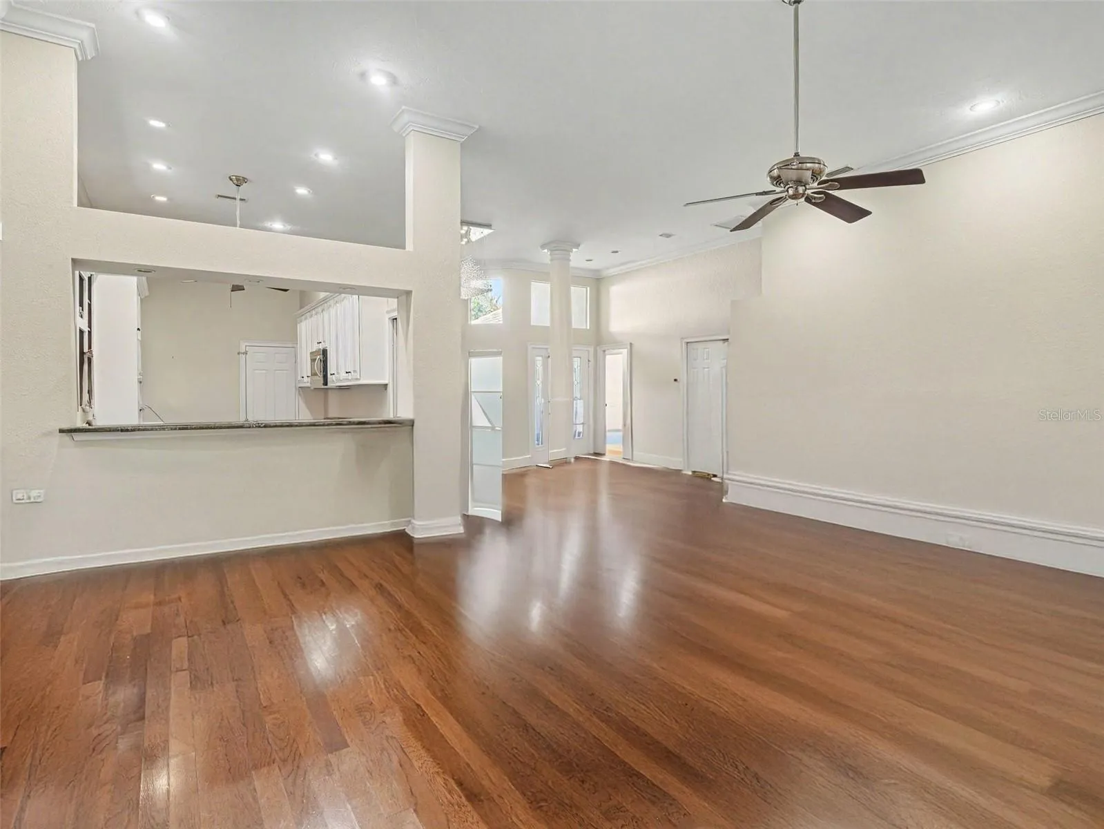 Living Room opens to Kitchen and Dining