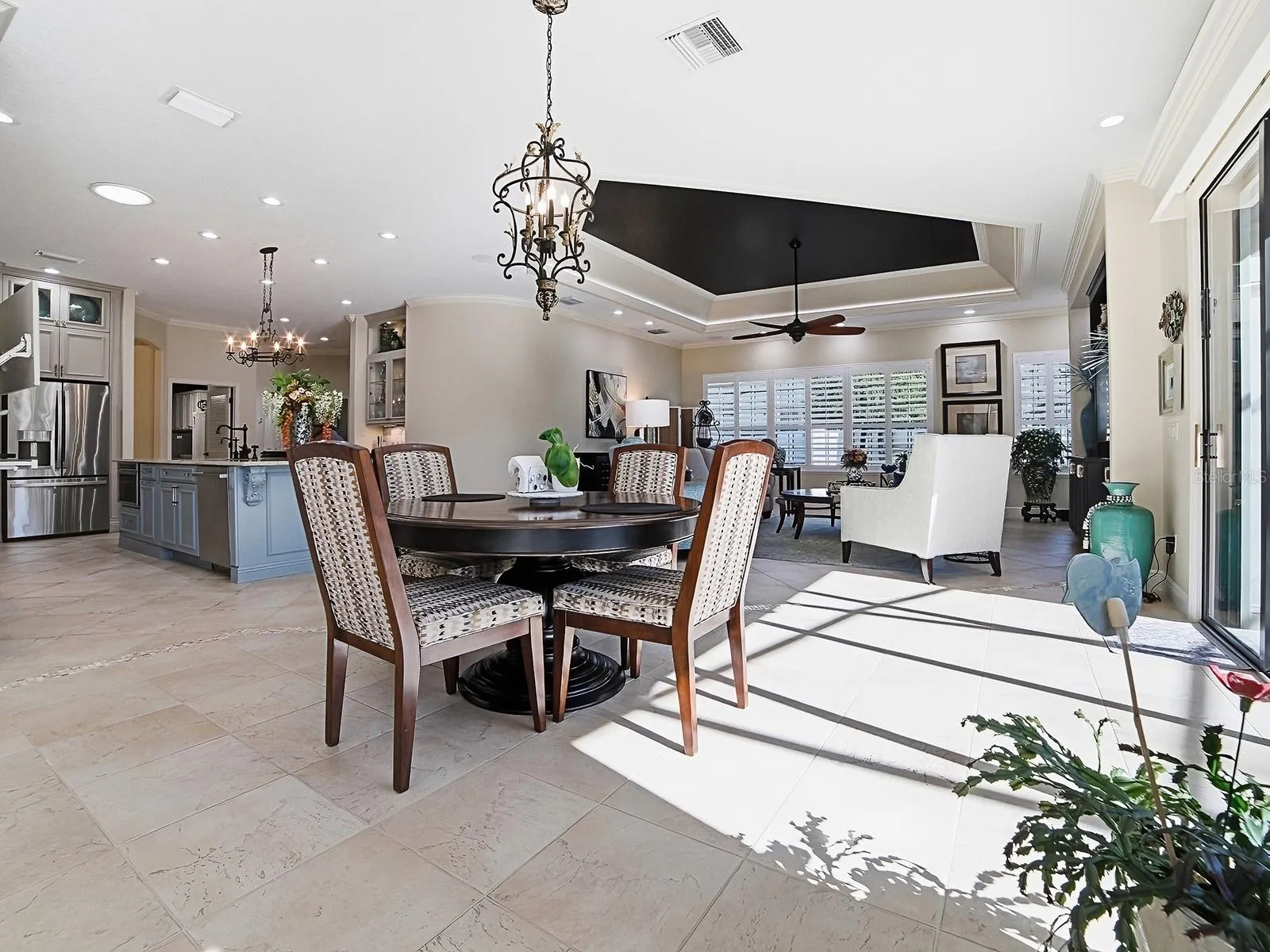 CASUAL DINING AREA OFF OF THE KITCHEN AND LARGE FAMILY ROOM.