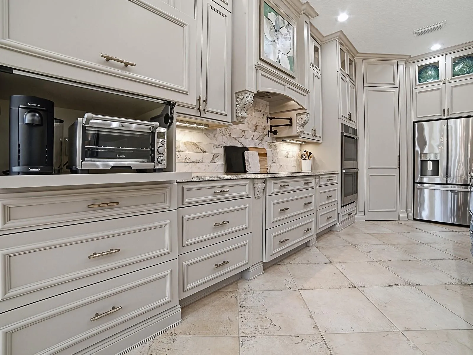 AN APPLIANCE GARAGE - GREAT FOR A COFFEE BAR, INSTANT HOT WATER, PLENTY OF COUNTER AND STORAGE SPACE!