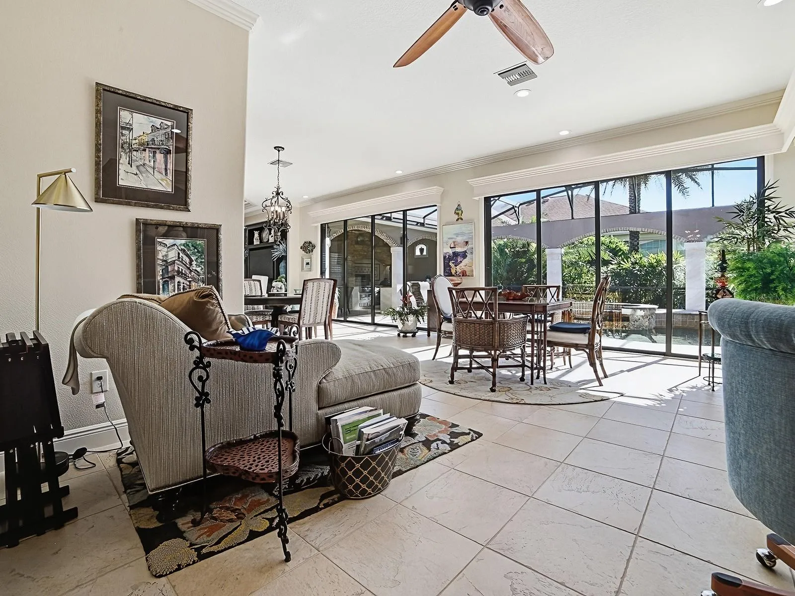 THE FAMILY ROOM AND THE BONUS AREA HAS A GREAT VIEW OF THE POOL AND LANDCAPING.