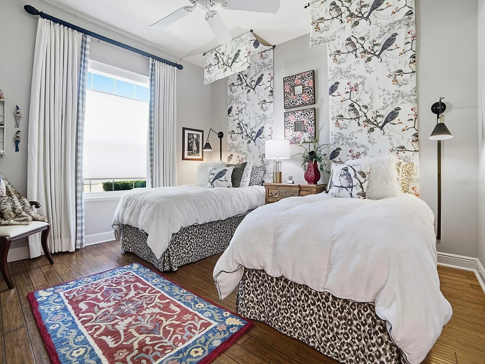 2ND GUEST ROOM WITH THE SAME BEAUTIFUL HARDWOOD FLOORINIG, CUSTOM DRAPES, AND UP-DOWN SHADES.