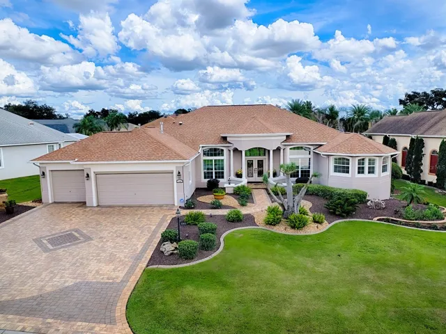 BOND PAID ON THIS SPECTACULAR CUSTOM 4700+ SF 4 BEDROOM, 3 BATH, AND 3 GAR GARAGE WITH AN AMAZING POOL AND SPA, OUTDOOR KITCHEN AND LOVELY TROPICAL SURROUNDINGS!