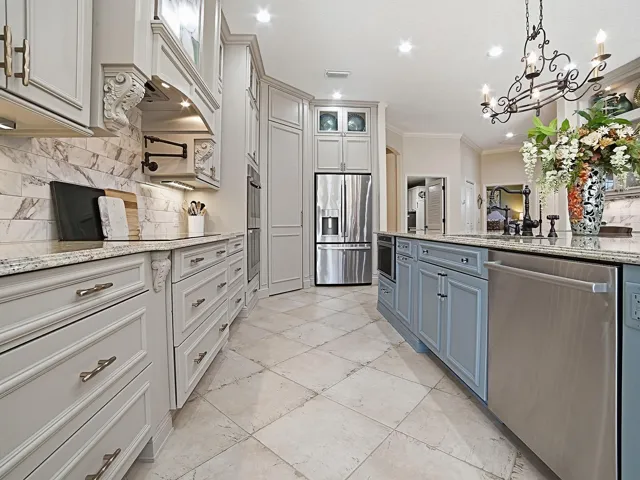 NEW CABINETRY, GRANITE COUNTERTOPS, STAINLESS APPLIANCES WITH 5 BURNER COOKTOP, HOOD, AND MICROWAVE DRAWER, POT DRAWERS, LIGHTING ............