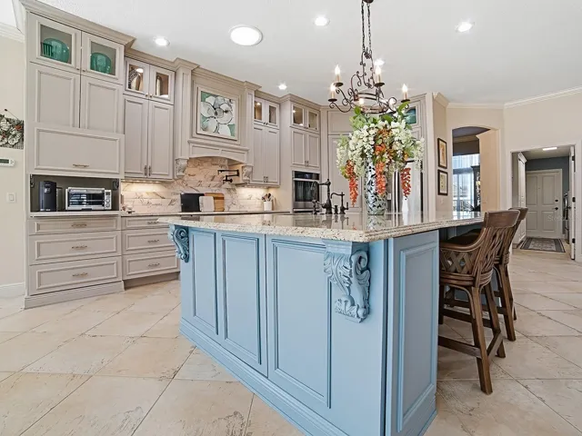 AROUND THE CORNER FROM THE DINING ROOM, YOU'LL FIND THE COMPLETELY RENOVATED, STUNNING KITCHEN.