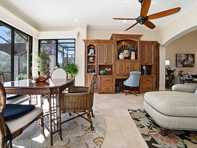 THE FAMILY ROOM FLOWS INTO THE BONUS ROOM WITH MORE SEATING FOR DINING AND/OR CARDS ANYONE? LOVELY BUILT-INS TOO!