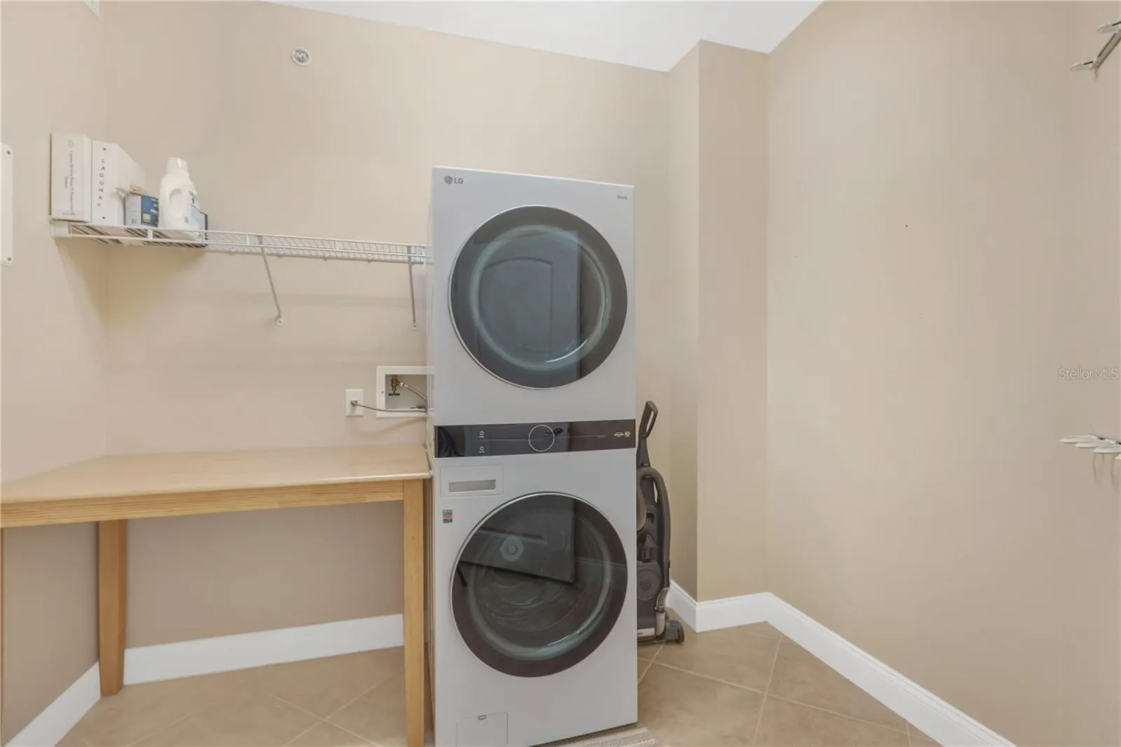 Laundry Room with New (2025) Washer and Dryer Tower.