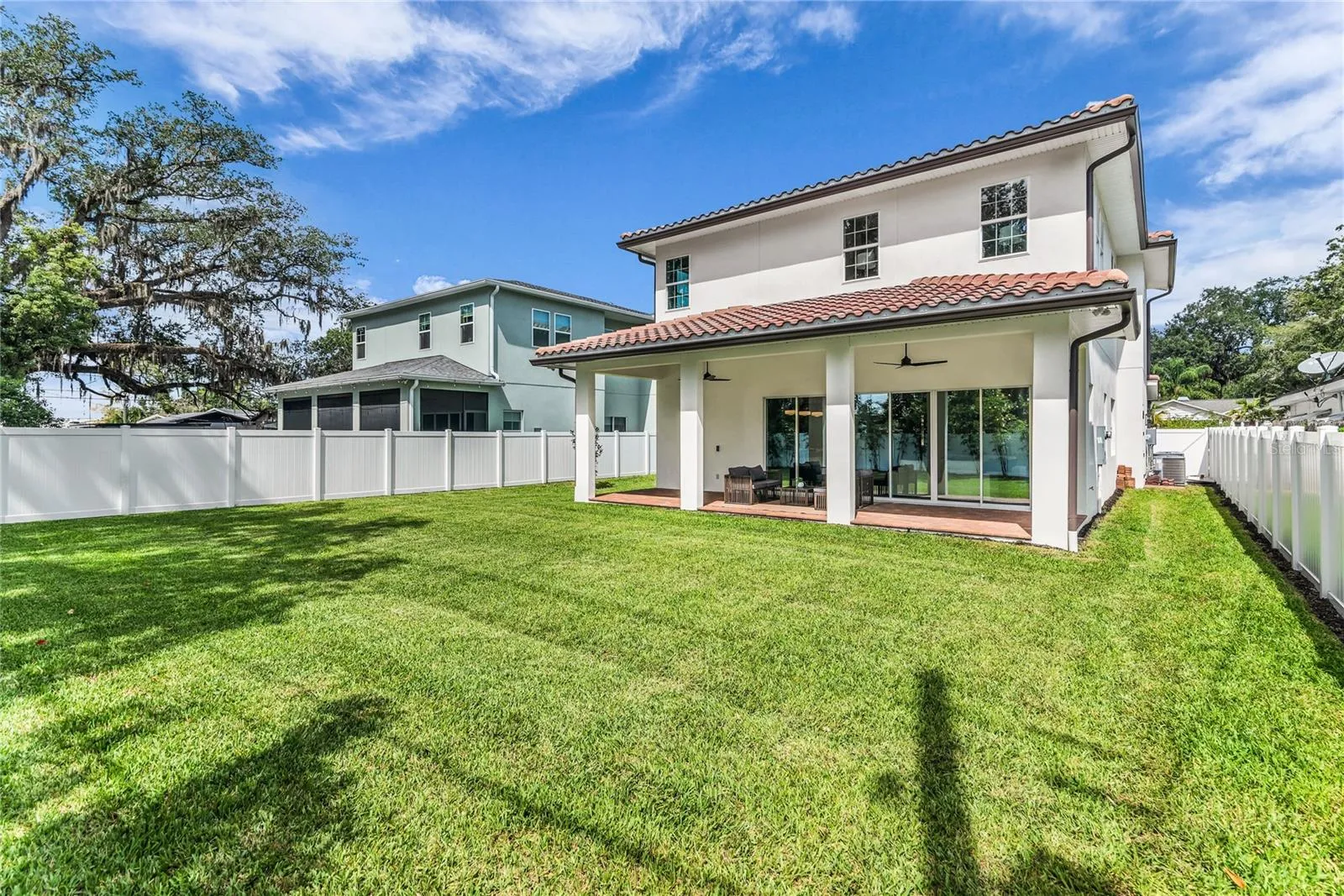 EXPANSIVE OVERSIZED BACK AND SIDE YARDS!