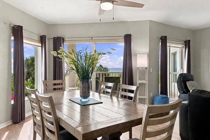 Generous Dining Area with Ample Seating and Gulf of Mexico Views in the Background