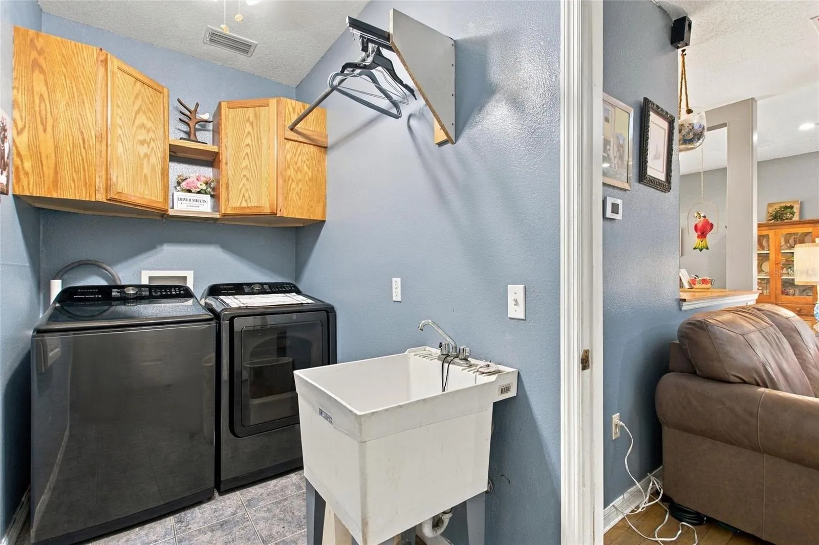 Laundry room is located off of the living area.  There is also access to the garage from the laundry room.