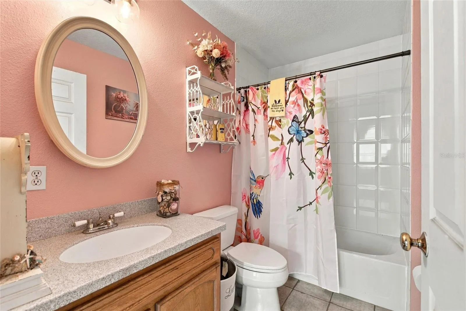 Upstairs bathroom that is between the two upstairs bedrooms.