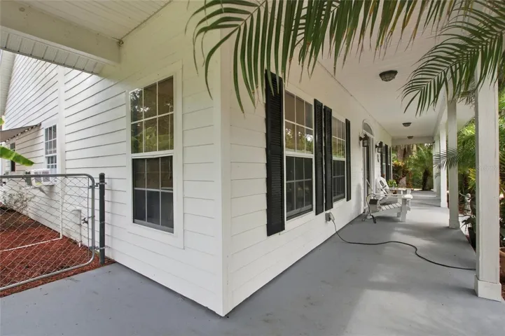 Front porch that wraps around to the garage side.