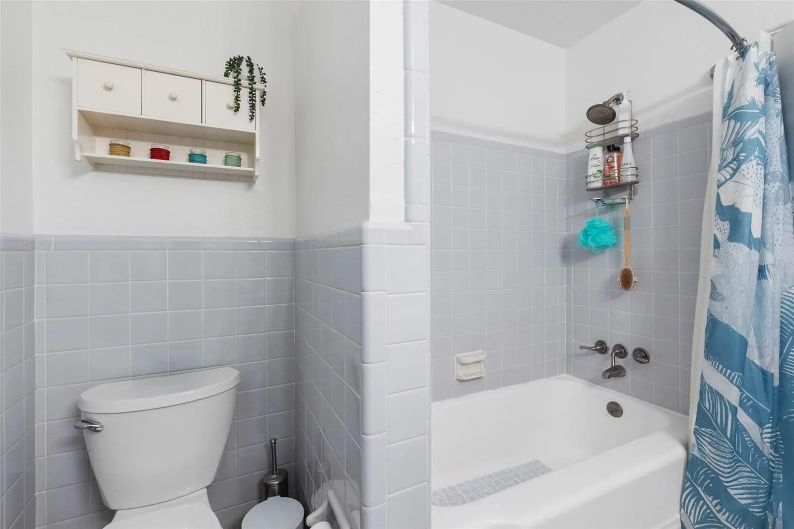 Bath/shower combo.