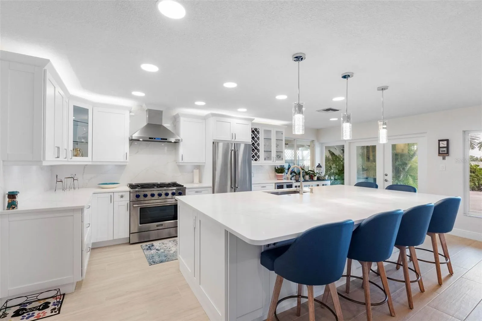 New modern kitchen with 6-burner stove with convention oven.