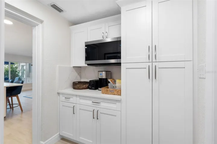 Butler's pantry off of kitchen.