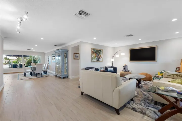 Open to dining area with pool views.